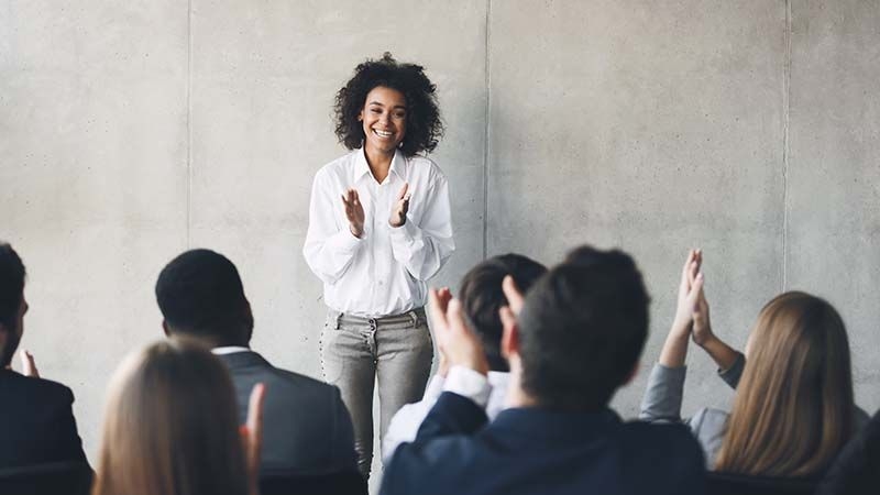 Teacher applauding class