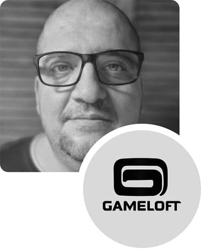 Portrait photo of George Iosif with the Gameloft Logo in the right-hand corner