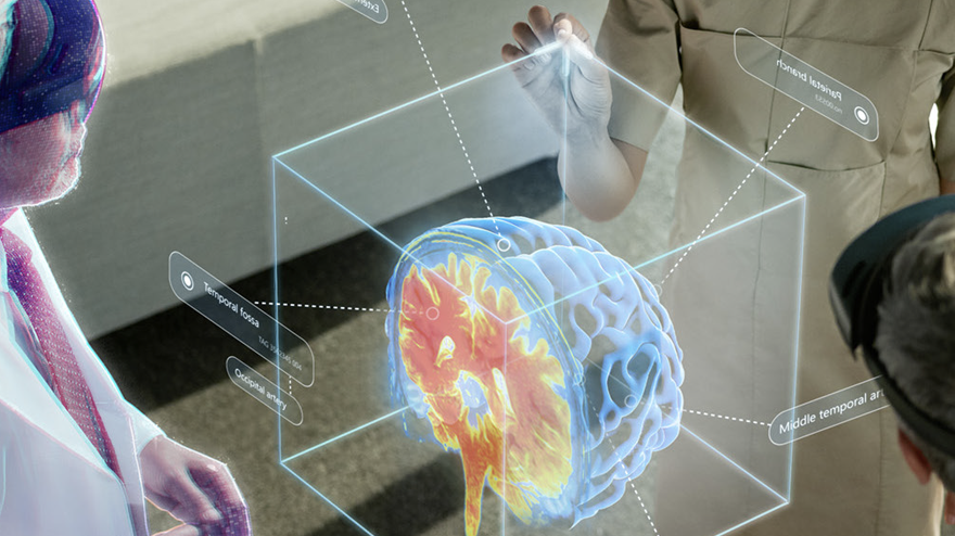 Doctors using AR to examine a 3D brain scan image