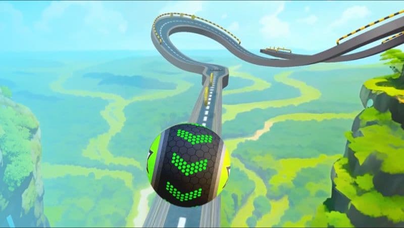 風光明媚な風景を横切る渦巻き状の高速道路を走行する丸いボールを示す3Dゲームのスクリーンショット
