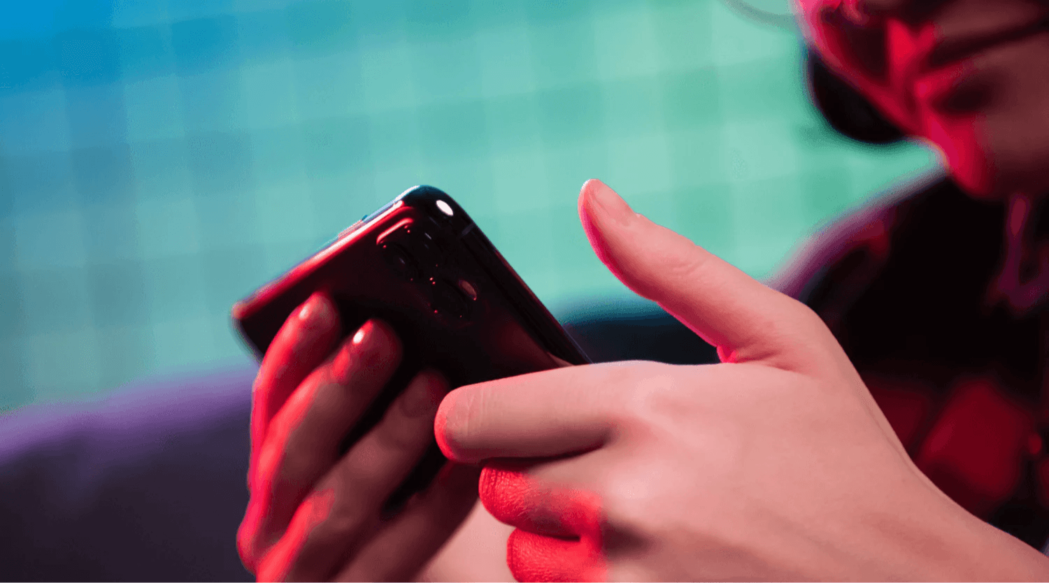 Close up image of someone holding a mobile device