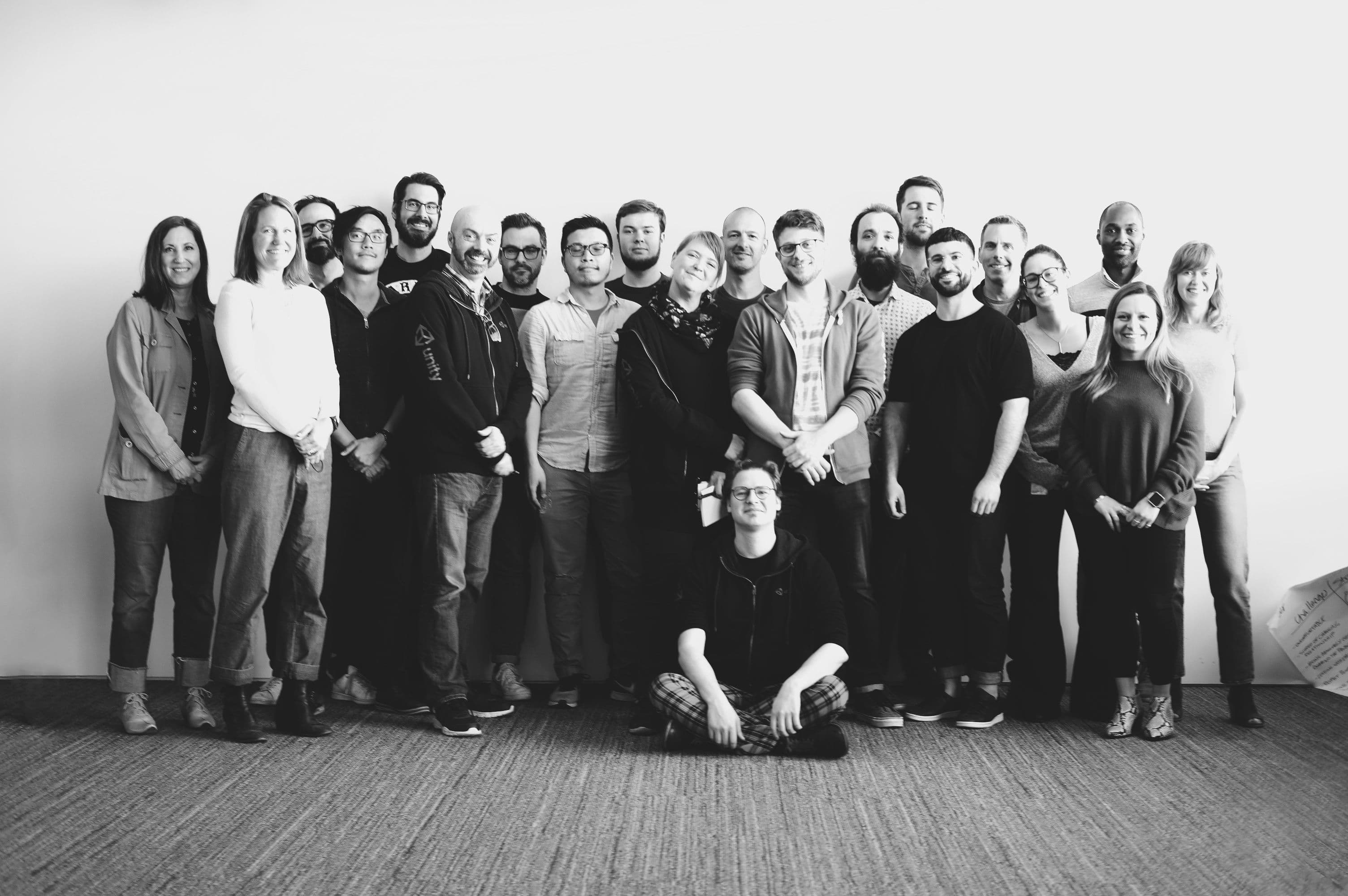 Black and white image of Unity employees