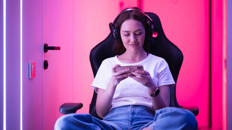 Girl playing a mobile game